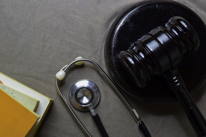 Black Judges gavel and stethoscope. Healthcare or Medical jurisprudence. Medical Law