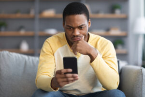 Man being cheated by an insurance adjuster who is not properly valuing his personal injury claim