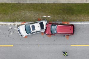 This is an aerial image of two cars involved in a crash resulting in personal injury.