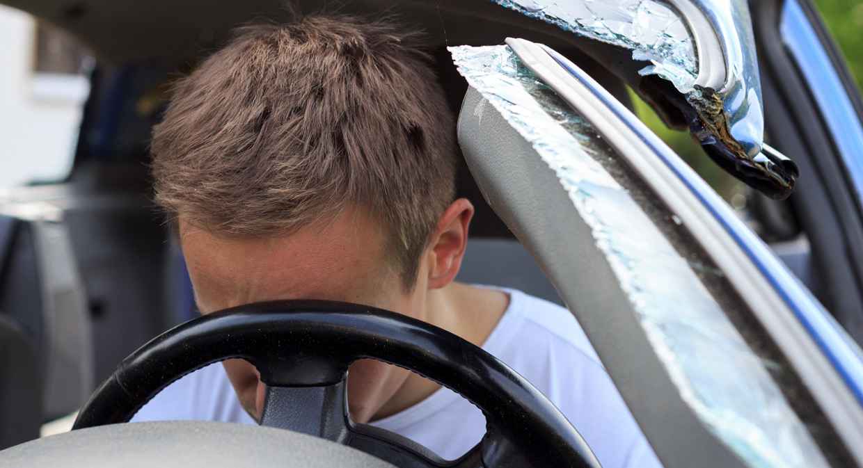 man with potential concussion due to car accident