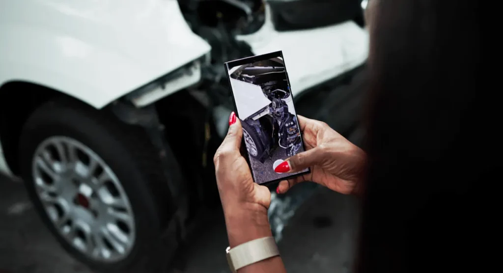 taking photos to document car crash